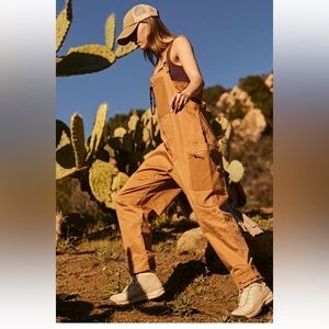 Free People Movement Wade On One Piece Zip Cargo Pockets Brown